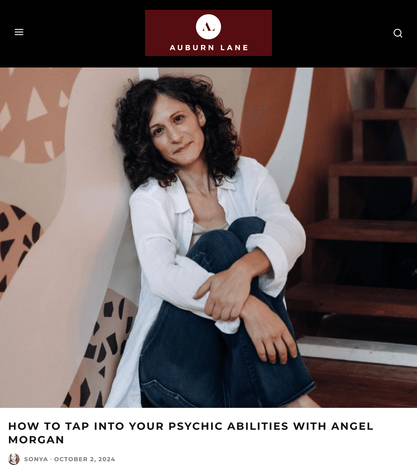 Angel Morgan teaching intuition, warm amber and sepia tones.